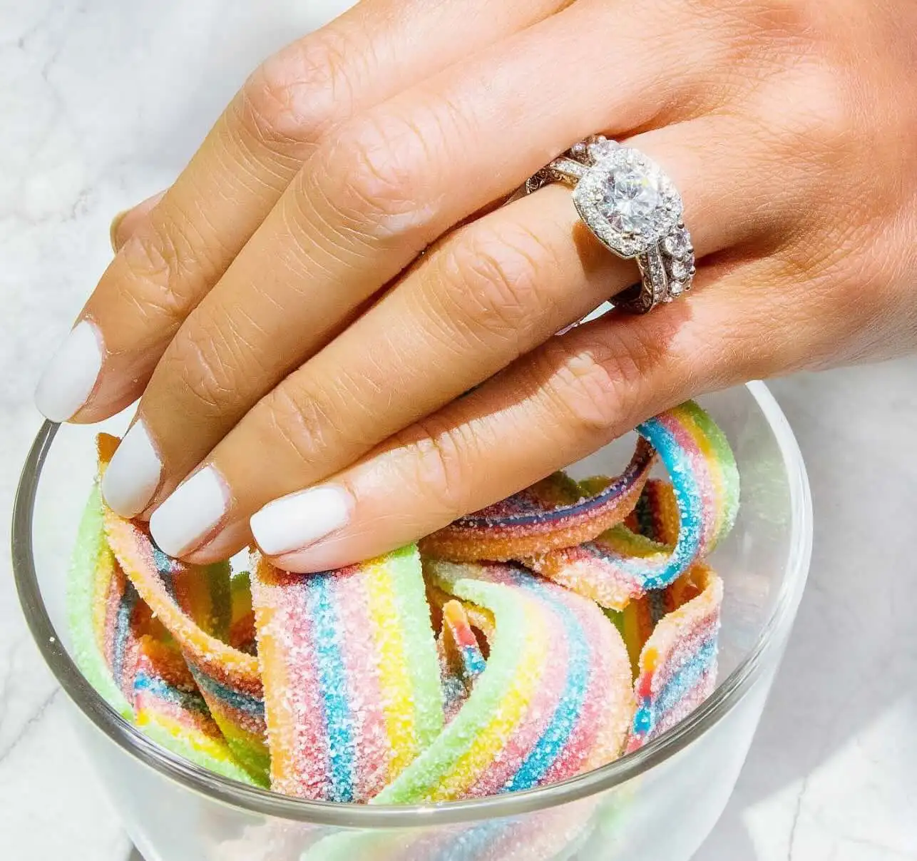 Jewellery Insurance Ring Policy. Hand in lollies